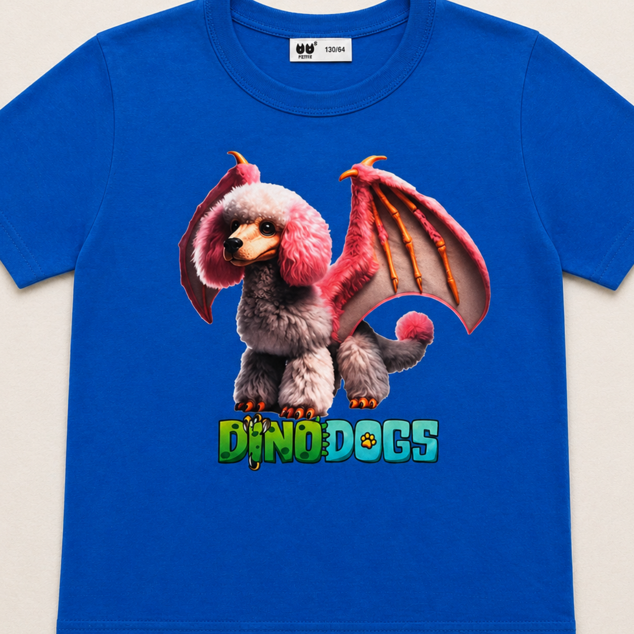 Piper the DinoDog is shown on a blue t-shirt along with the green and blue "DinoDogs" logo on a white background. 